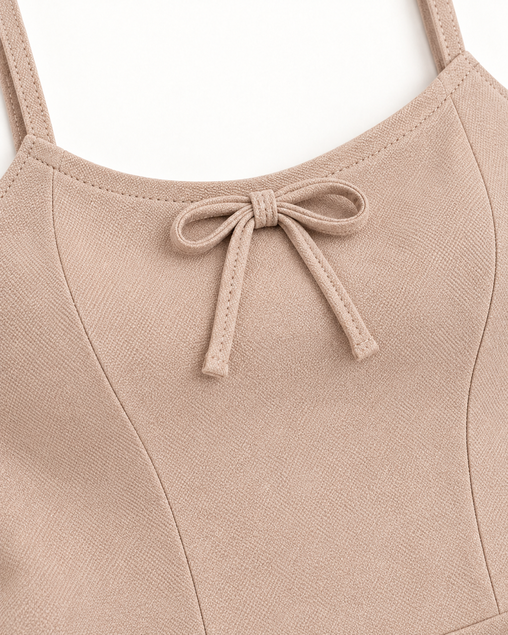 Peplum Luz beige — Detalle del lazo y tela